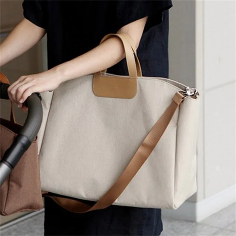 SEREQI fashion Mummy large capacity handbag outdoor travel shoulder bag baby care bag ladies fashion handbag bag women
SEREQI fashion Mummy large capacity handbag outdoor travel shoulder bag baby care bag ladies fashion handbag bag women
