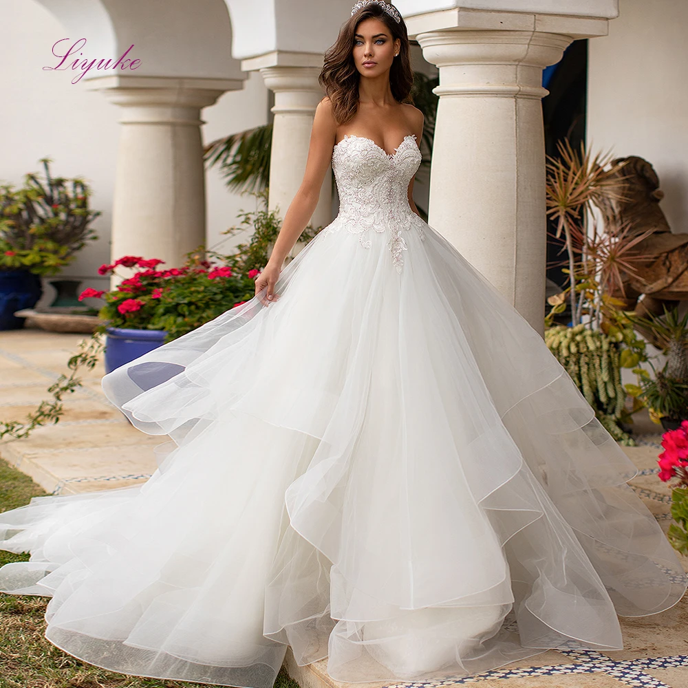 Liyuke 2019 Married Wedding Dress Ball Gown Strapless Lace Appliques Beadings Tiered Free Shipping Customized
Liyuke 2019 Married Wedding Dress Ball Gown Strapless Lace Appliques Beadings Tiered Free Shipping Customized
