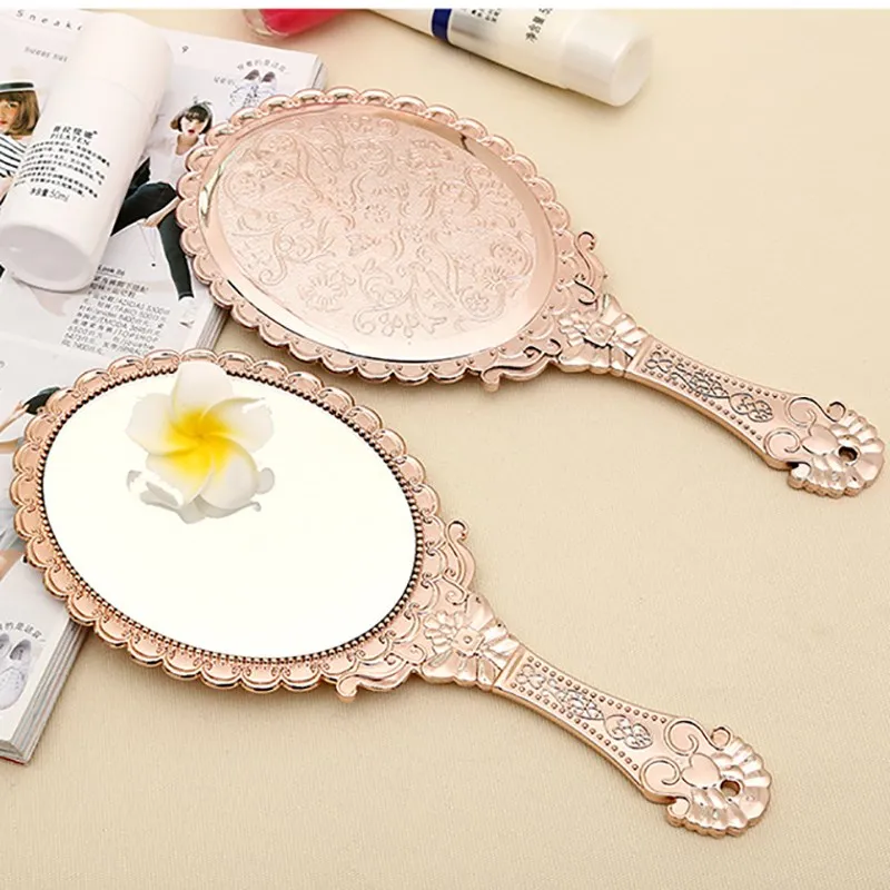 Vintage Makeup Mirror Flower Hand Hold Oval Round Cosmetic Mirror Noble Restore Ancient Style Court Mirrors Beauty Tool 2018
Vintage Makeup Mirror Flower Hand Hold Oval Round Cosmetic Mirror Noble Restore Ancient Style Court Mirrors Beauty Tool 2018