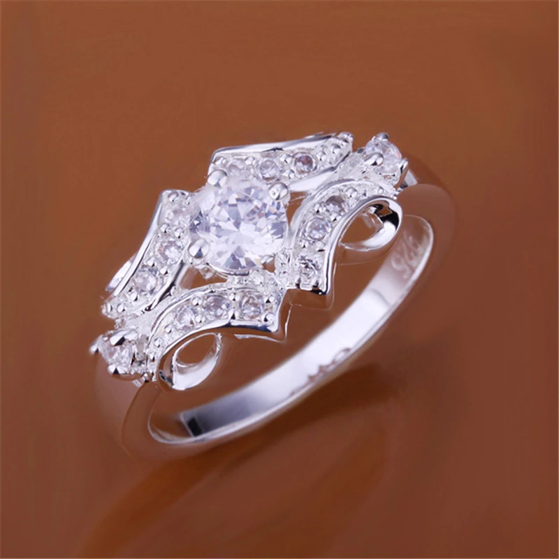 LOREDANA Ladies fashion hollowed-out copper zircon ring, exquisite workmanship shiny charming suitable for party engagement.
LOREDANA Ladies fashion hollowed-out copper zircon ring, exquisite workmanship shiny charming suitable for party engagement.