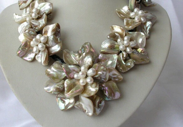 huij 0033034 classic white baroque freshwater pearl shell flower leather necklace
huij 0033034 classic white baroque freshwater pearl shell flower leather necklace