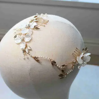 Iimitate pearl flower long hair comb crystal flower hair comb women headdress wedding bride hair accessories wholesale
Iimitate pearl flower long hair comb crystal flower hair comb women headdress wedding bride hair accessories wholesale
