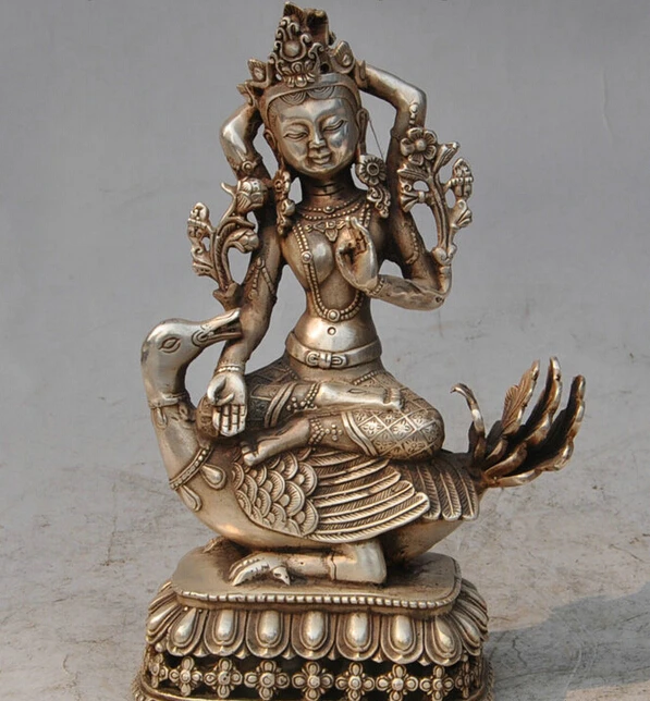 song voge gem S4740 8" Tibet Silver Buddhist 4 Arms Kwan-yin GuanYin Goddess Buddha Ride Duck Statue
song voge gem S4740 8" Tibet Silver Buddhist 4 Arms Kwan-yin GuanYin Goddess Buddha Ride Duck Statue