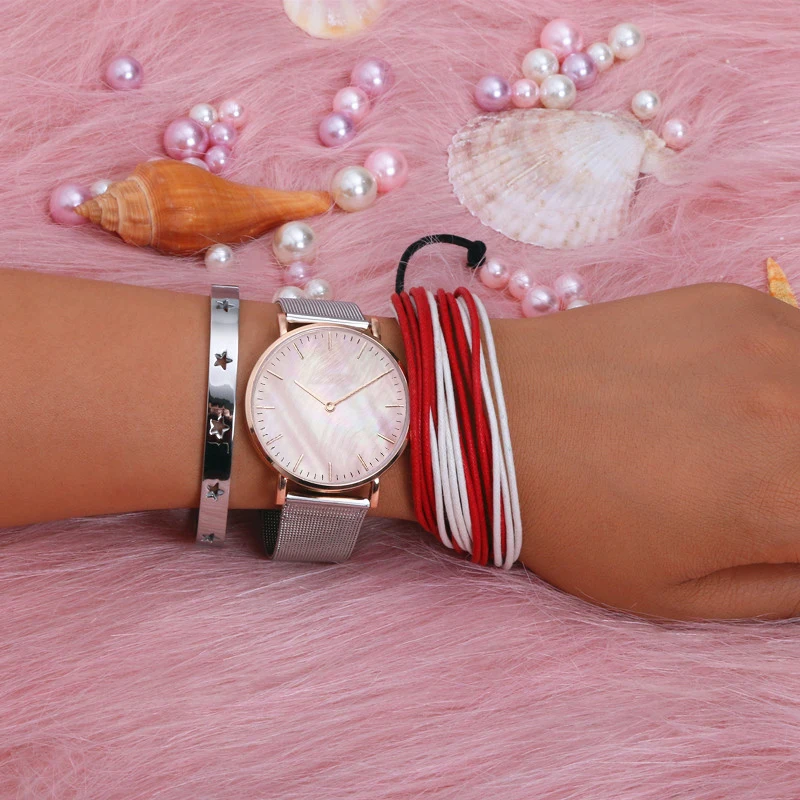 Mavis Hare Pink Seashell Mesh Pearl dial Wristwatch with Star Bracelet & Bangle and multicolor Handmade Wax rope Bracelet
Mavis Hare Pink Seashell Mesh Pearl dial Wristwatch with Star Bracelet & Bangle and multicolor Handmade Wax rope Bracelet