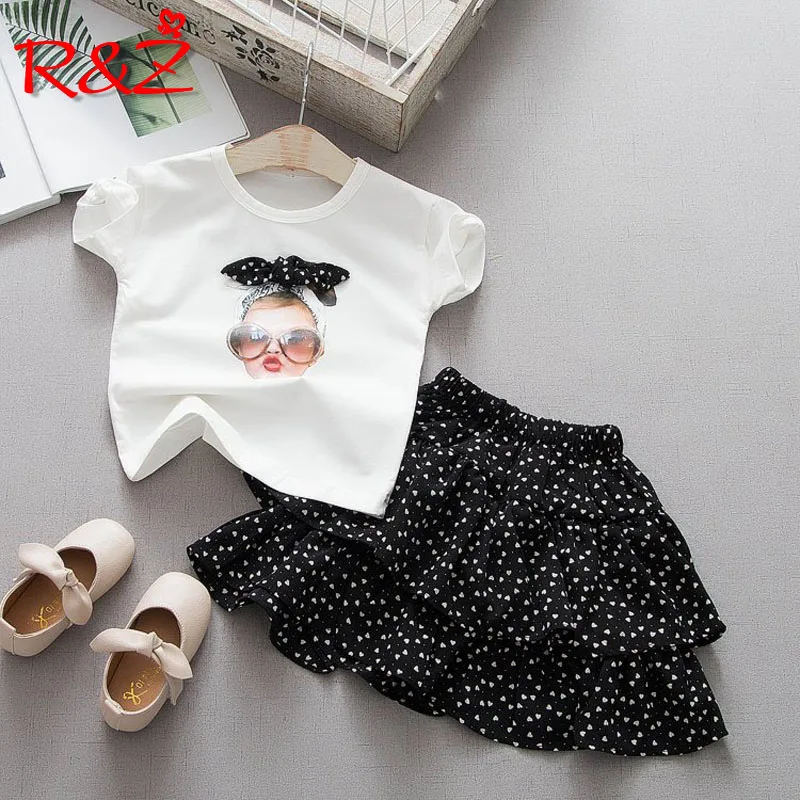 R&Z Children's Set 2019 Summer New Girls Set Girls Summer Set Cotton Print Short Sleeve Polka Dot Cake Skirt Two-piece Set
R&Z Children's Set 2019 Summer New Girls Set Girls Summer Set Cotton Print Short Sleeve Polka Dot Cake Skirt Two-piece Set