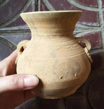 Antique imitation Han Dynasty unearthed pottery, double ears, canister, ancient porcelain, antique
Antique imitation Han Dynasty unearthed pottery, double ears, canister, ancient porcelain, antique