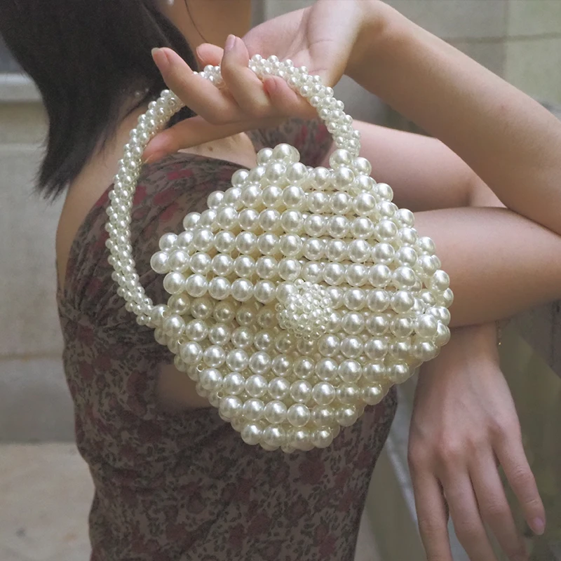 Handmade Pearl Handbags Mini Woven Beaded Bags Elegant Evening Bride Clutch Bag Handbags Women Famous Brands Purse 2019 Totes
Handmade Pearl Handbags Mini Woven Beaded Bags Elegant Evening Bride Clutch Bag Handbags Women Famous Brands Purse 2019 Totes