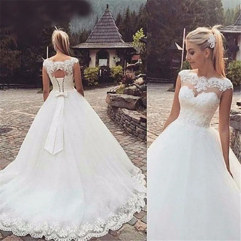 Sexy Scoop Neck Wedding Dresses 2019 Top Lace Appliques Sleeveless Cap Sleeve Bridal Gowns Sweep Train Vestido De Noiva
Sexy Scoop Neck Wedding Dresses 2019 Top Lace Appliques Sleeveless Cap Sleeve Bridal Gowns Sweep Train Vestido De Noiva