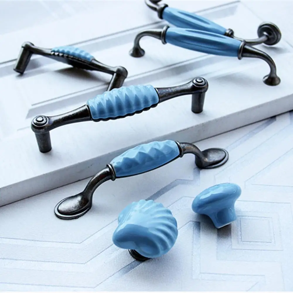 Mediterranean ceramic handle blue European pastoral drawer single hole starfish shell handle cabinet closet door handle
Mediterranean ceramic handle blue European pastoral drawer single hole starfish shell handle cabinet closet door handle