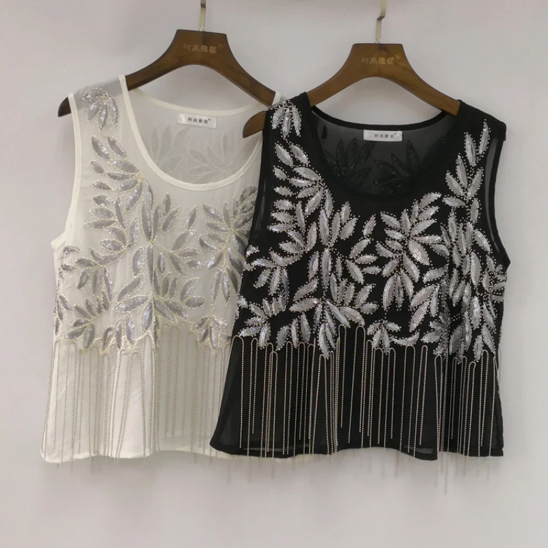 Summer New Arrival O Neck Pullover Women Tassel Sleeveless Tops 2018 Unique Sequins Embroidery Leaf Perspective Mesh Short Tops
Summer New Arrival O Neck Pullover Women Tassel Sleeveless Tops 2018 Unique Sequins Embroidery Leaf Perspective Mesh Short Tops