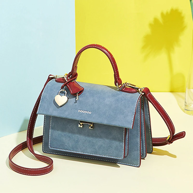 2018 new fashion retro style organ bag female wild simple color matching messenger bag.
2018 new fashion retro style organ bag female wild simple color matching messenger bag.