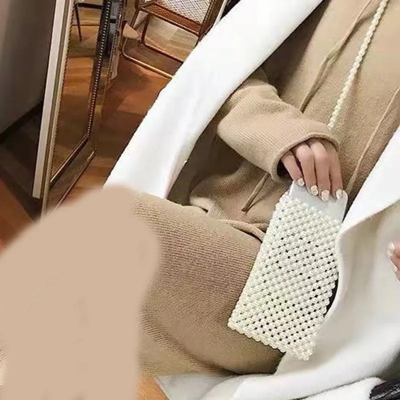 Handmade new Japanese and Korean net red with the same fashion wild full pearl necklace diagonal cross-body phone bag female
Handmade new Japanese and Korean net red with the same fashion wild full pearl necklace diagonal cross-body phone bag female