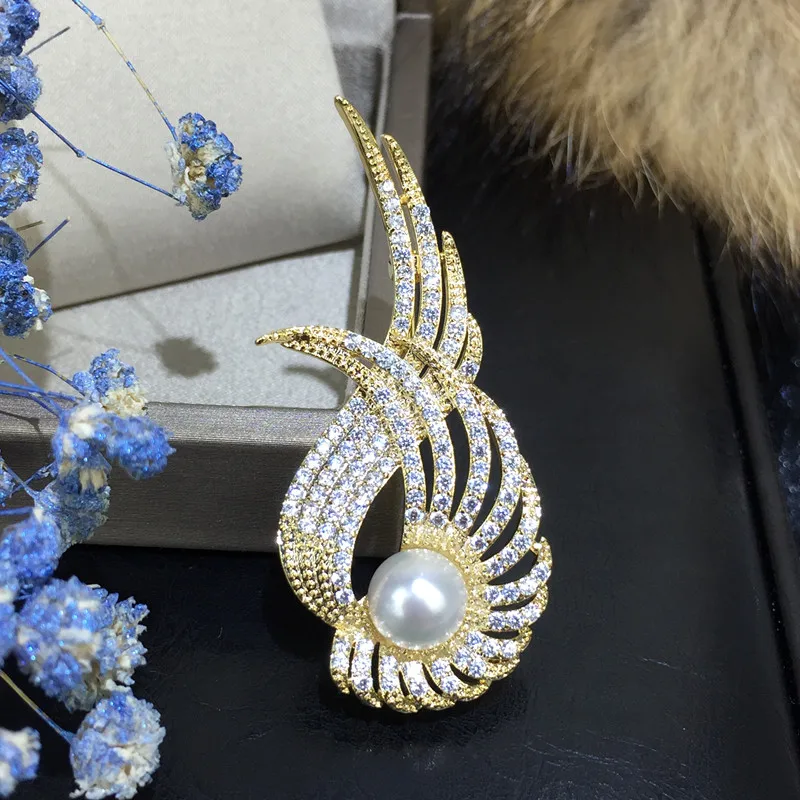 Korean version of the high-grade retro flowers Swan brooch natural 10-11mm pearl brooch wedding bride corsage
Korean version of the high-grade retro flowers Swan brooch natural 10-11mm pearl brooch wedding bride corsage