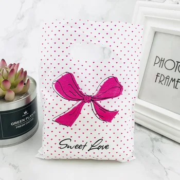 New Design 15x20cm Hot Pink Polka Dot Bow Jewelry Plastic Bag With Handles 100pcs Shopping Bag Packaging Wedding Decoration
New Design 15x20cm Hot Pink Polka Dot Bow Jewelry Plastic Bag With Handles 100pcs Shopping Bag Packaging Wedding Decoration