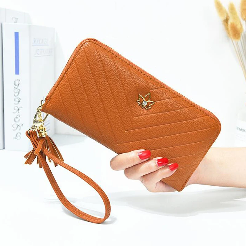 Flower new large capacity ladies clutch bag Korean version of the multi-function wallet female long zipper wallet clutch bag
Flower new large capacity ladies clutch bag Korean version of the multi-function wallet female long zipper wallet clutch bag