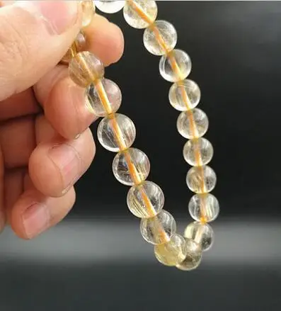 free shipping 9.5-10mm Natural Gold Rutilated Quartz Crystal Round Beads Bracelet AA
free shipping 9.5-10mm Natural Gold Rutilated Quartz Crystal Round Beads Bracelet AA