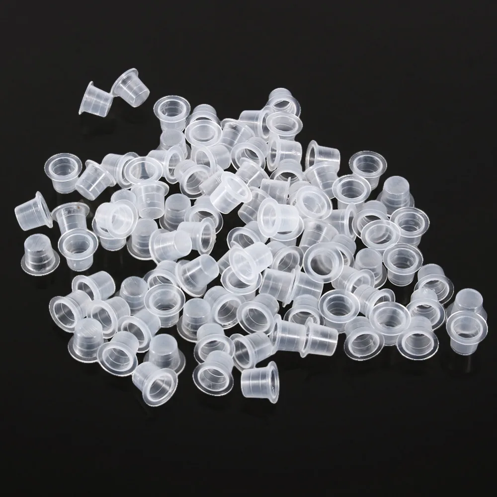 100Pcs Small Tattoo Ink Cups Machine Pigment Ink Cups Cap Tattoo Pigment Cups Supply Set Professional For Permanent Body Makeup 
100Pcs Small Tattoo Ink Cups Machine Pigment Ink Cups Cap Tattoo Pigment Cups Supply Set Professional For Permanent Body Makeup