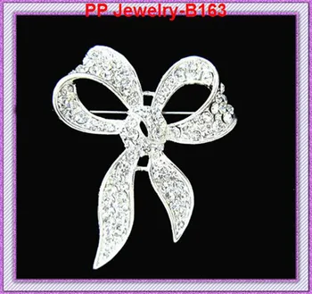 silver tone Clear rhinestone bow luxury brooch for wedding,party.etc 120pcs/lot
silver tone Clear rhinestone bow luxury brooch for wedding,party.etc 120pcs/lot