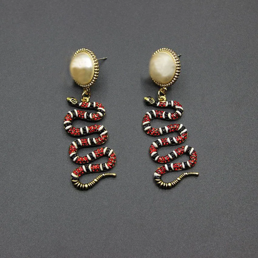 Baroque retro court fashion earrings baroque serpentine gem color nightclub ladies earrings 461
Baroque retro court fashion earrings baroque serpentine gem color nightclub ladies earrings 461