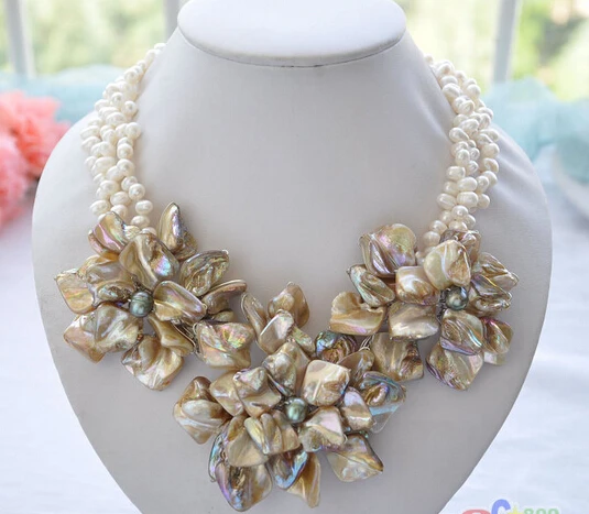 Handmade 3row 18" white rice pearl shell Knitting flower necklace AAA style Fine Noble real Natural free shipping
Handmade 3row 18" white rice pearl shell Knitting flower necklace AAA style Fine Noble real Natural free shipping