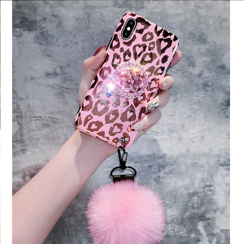 DIY Fur Hair Ball Jewelled Bracket with Wrist Strap Soft IMD Leopard Bling Phone Case For iphone X 6 6s 7 8 Plus XS MAX XR Coque
DIY Fur Hair Ball Jewelled Bracket with Wrist Strap Soft IMD Leopard Bling Phone Case For iphone X 6 6s 7 8 Plus XS MAX XR Coque