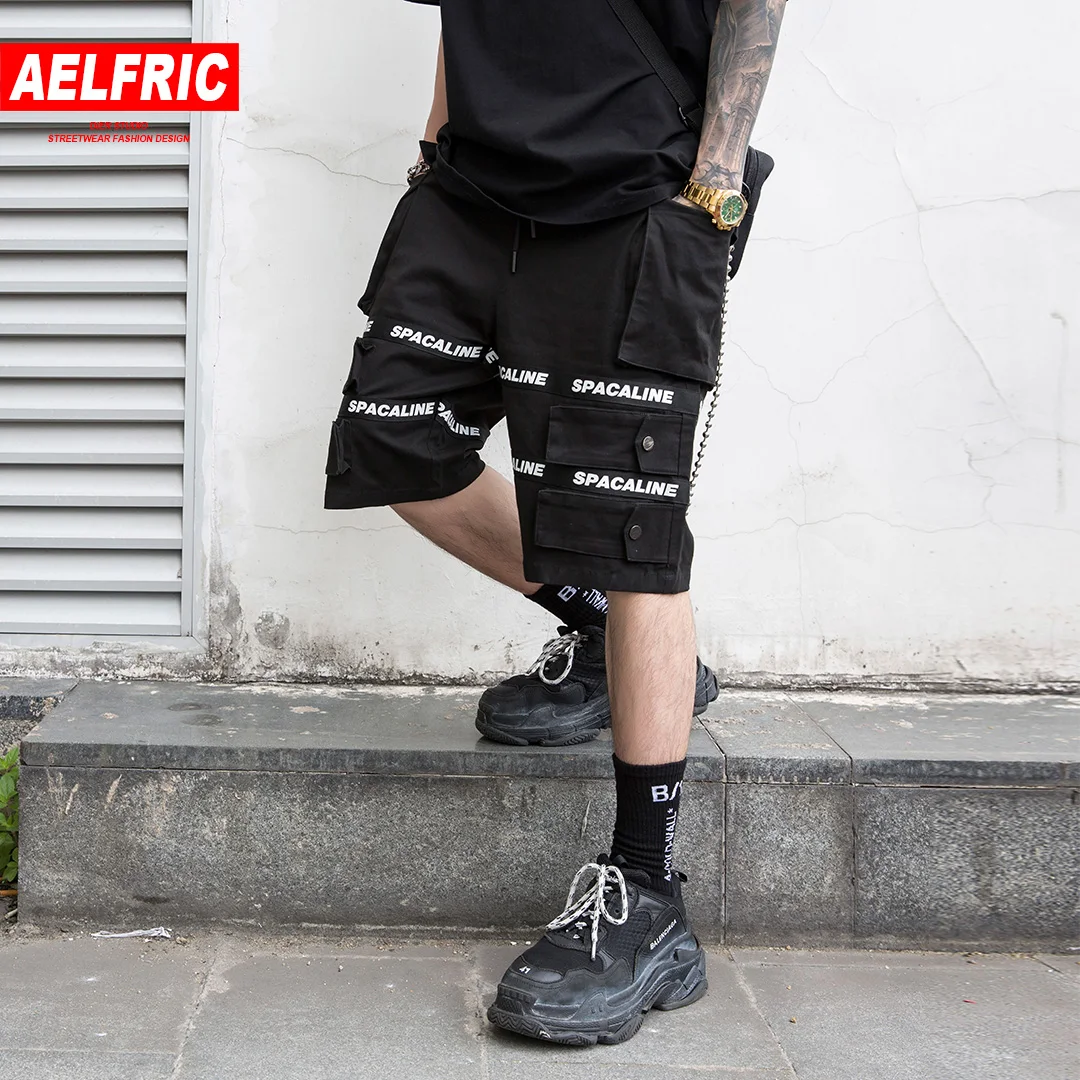 AELFRIC Letter Stripe Casual Shorts Men 2019 Summer Cotton Hip Hop Knee Length Fashion Short Jogger Black Harajuku Streetwear
AELFRIC Letter Stripe Casual Shorts Men 2019 Summer Cotton Hip Hop Knee Length Fashion Short Jogger Black Harajuku Streetwear