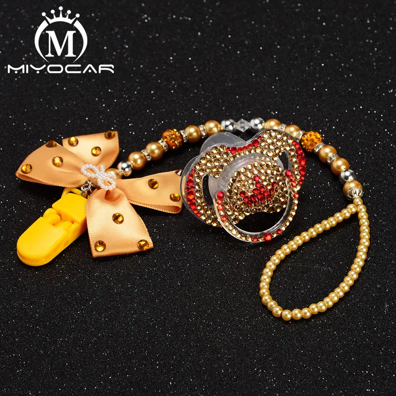 MIYOCAR golden bow bling rhinestone pacifier clip holder dummy clip with bling golden crown pacifier dummy idea gift
MIYOCAR golden bow bling rhinestone pacifier clip holder dummy clip with bling golden crown pacifier dummy idea gift
