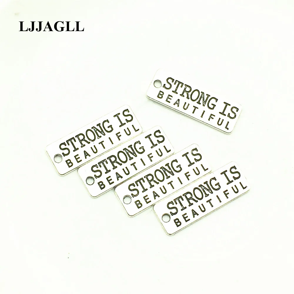 LJJAGLL Metal Silver 80pcs "STRENGTH IS BEAUTIFUl" tags Charm 10*27mm Fitness letter Plate Pendant Fit Jewelry DIY Making AYD019
LJJAGLL Metal Silver 80pcs "STRENGTH IS BEAUTIFUl" tags Charm 10*27mm Fitness letter Plate Pendant Fit Jewelry DIY Making AYD019