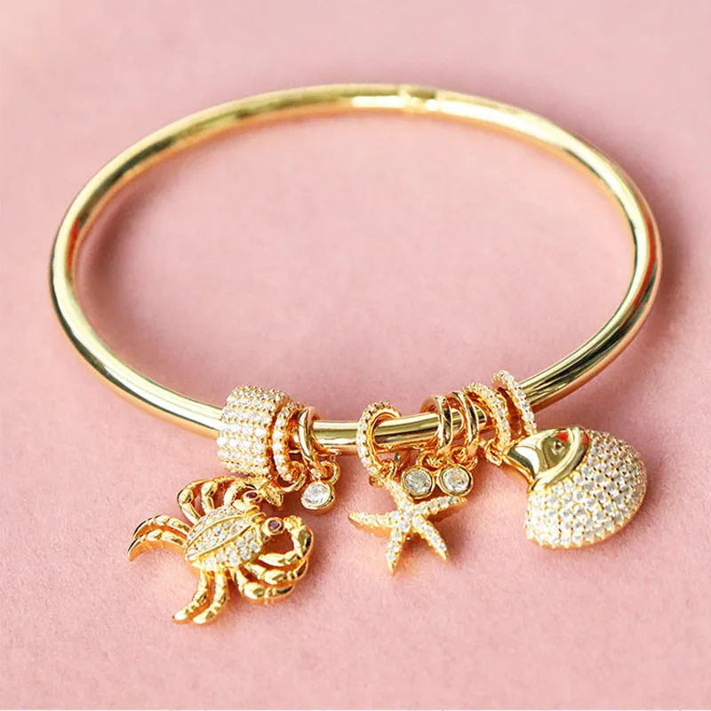 SLJELY 925 Sterling Silver Gold Color Sea Creatures Bangle with Crab Shell Star Micro Cubic Zirconia for Women Bracelet Jewelry
SLJELY 925 Sterling Silver Gold Color Sea Creatures Bangle with Crab Shell Star Micro Cubic Zirconia for Women Bracelet Jewelry