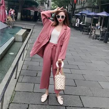 Two piece set top and pants spring and summer temperament commute OL suit wide leg pants two-piece female loose solid color suit
Two piece set top and pants spring and summer temperament commute OL suit wide leg pants two-piece female loose solid color suit