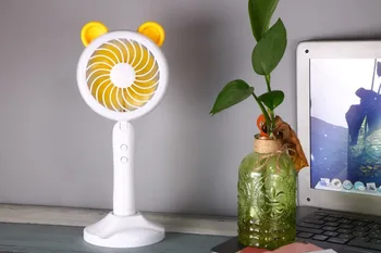 Hot cartoon handheld USB silent desktop fan Charging with LED fill light student dormitory portable desktop fan 
Hot cartoon handheld USB silent desktop fan Charging with LED fill light student dormitory portable desktop fan