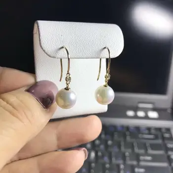 charming pair of 10-11mm south sea round white pearl diamond earring 18k
charming pair of 10-11mm south sea round white pearl diamond earring 18k