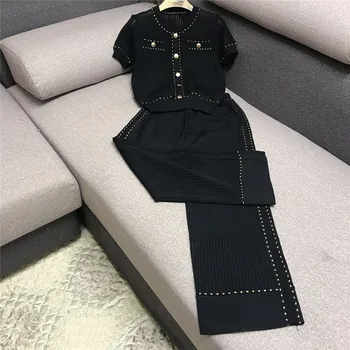 CBAFU knitting wide legs pants suit women summer metal buckle hollow out sweater pants 2 piece set knitted women's set D760
CBAFU knitting wide legs pants suit women summer metal buckle hollow out sweater pants 2 piece set knitted women's set D760