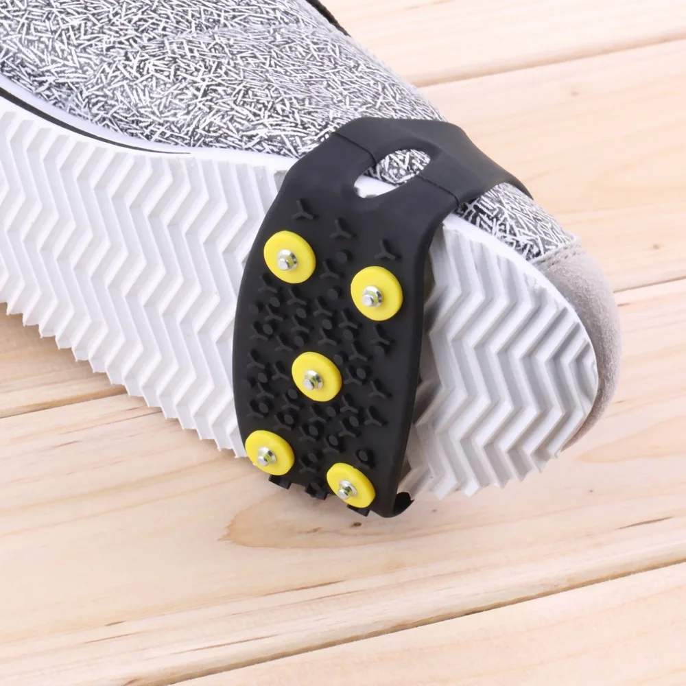 1pair Delicate Snow Ice Climbing Anti Slip Spikes Grips Crampon Cleats 5-Stud Shoes Cover fasten overshoes to your shoes
1pair Delicate Snow Ice Climbing Anti Slip Spikes Grips Crampon Cleats 5-Stud Shoes Cover fasten overshoes to your shoes