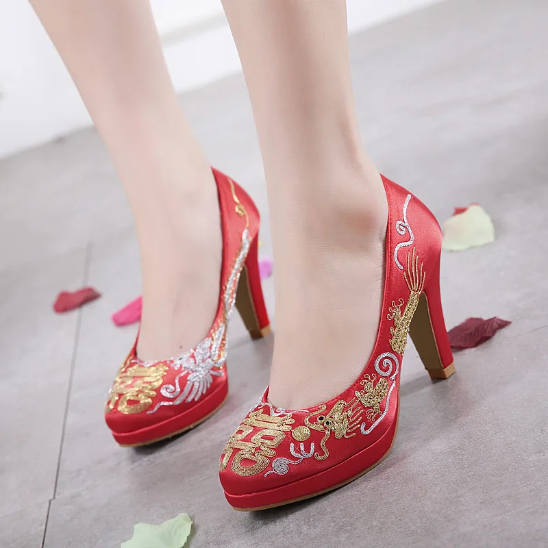 Satin shallow mouth waterproof platform high heels red hi word embroidered Chinese style traditional wedding shoes
Satin shallow mouth waterproof platform high heels red hi word embroidered Chinese style traditional wedding shoes