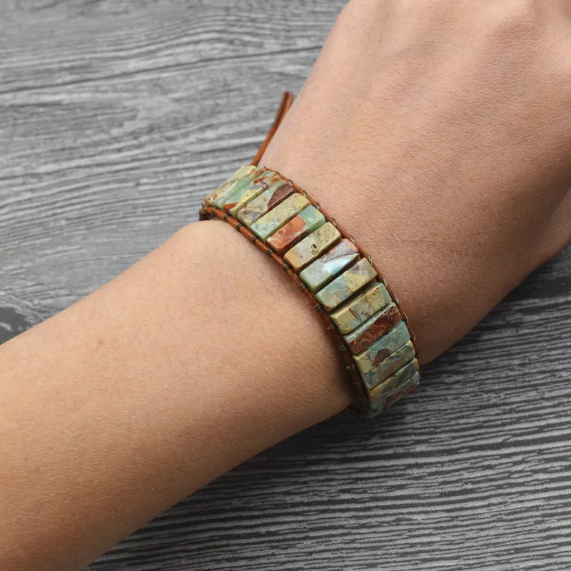 Single layer handmade leather woven natural stone crystal 7 chakra bracelet women's Bohemian style bracelet beach resort
Single layer handmade leather woven natural stone crystal 7 chakra bracelet women's Bohemian style bracelet beach resort