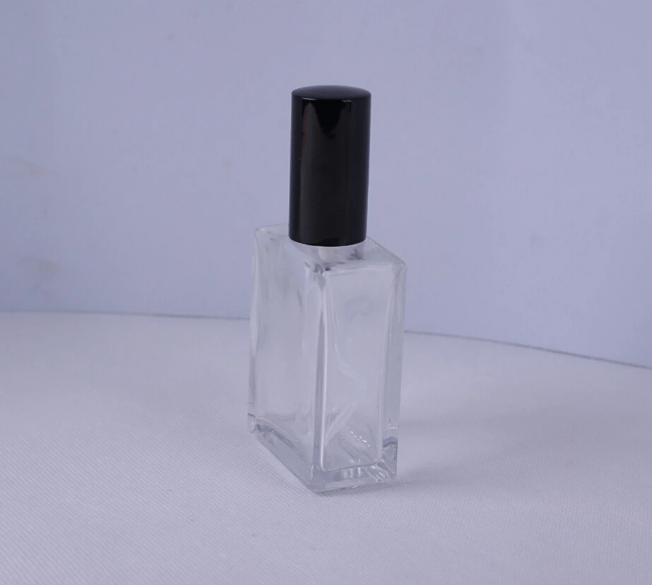 50pcs/lot Polished Perfume Bottle Design 50ml Square Empty Glass Parfum Bottle In Refillable With Lid
50pcs/lot Polished Perfume Bottle Design 50ml Square Empty Glass Parfum Bottle In Refillable With Lid