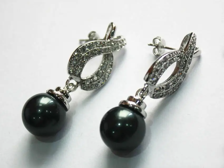 latest fashion lady's beautiful silver plated leave shape +12mm black shell pearl bread earring
latest fashion lady's beautiful silver plated leave shape +12mm black shell pearl bread earring