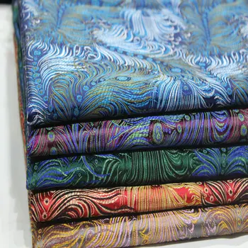 

Jacquard woven brocade silk fabric cheongsam EVA dress cos Mongolian robe decorated with handmade fabric / peacock feathers