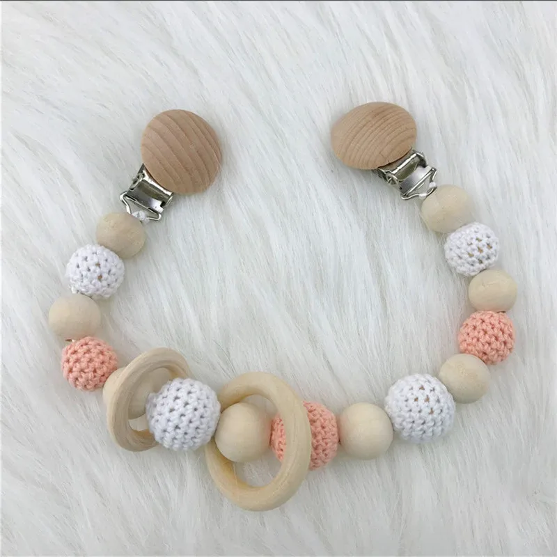 Cute Baby Natural Wooden Handmade Crochet Pacifier Clip Pram Chain Garland Baby Teether Baby Shower Gifts Peach Cream Rattle
Cute Baby Natural Wooden Handmade Crochet Pacifier Clip Pram Chain Garland Baby Teether Baby Shower Gifts Peach Cream Rattle