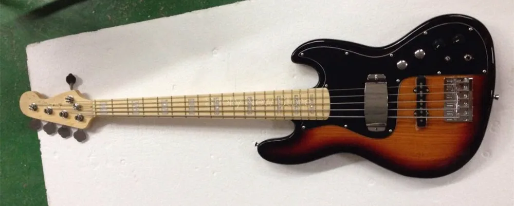 Shelly new store factory custom Jazz Ash body bass 5 strings white maple fingerboard active pickup miller electric bass guitar
Shelly new store factory custom Jazz Ash body bass 5 strings white maple fingerboard active pickup miller electric bass guitar