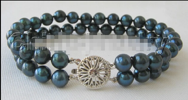Free shipping@@@@ @ 8" 2row 7mm peacock blue perfect round seawater akoya pearl bracelet
Free shipping@@@@ @ 8" 2row 7mm peacock blue perfect round seawater akoya pearl bracelet