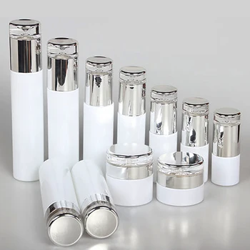 Wholesale 50g glass jar travel bottle pearl white cream container makeup packaging with shiny silver and golden cap
Wholesale 50g glass jar travel bottle pearl white cream container makeup packaging with shiny silver and golden cap