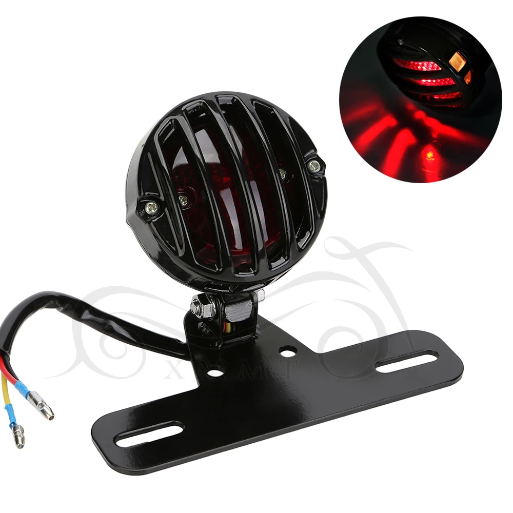 Retro Red Rear Grill Tail Brake Stop Light Lamp With License Plate Mount For Harley Suzuki Honda Yamaha Cafe Racer Custom
Retro Red Rear Grill Tail Brake Stop Light Lamp With License Plate Mount For Harley Suzuki Honda Yamaha Cafe Racer Custom