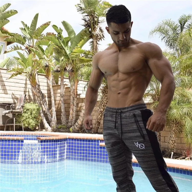 Running Training Pants Men Sweatpants Gym Fitness Tights Elastic Sportwear Workout Jogging Homme Pants Men's Trousers
Running Training Pants Men Sweatpants Gym Fitness Tights Elastic Sportwear Workout Jogging Homme Pants Men's Trousers