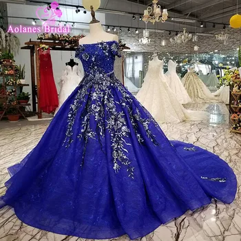 Aolanes 2018 Short Sleeves Royal BLue Lace Beaded Bridal Gowns Boat Neck Royal Train Ball Gown Off The Shoulder Wedding Dresses
Aolanes 2018 Short Sleeves Royal BLue Lace Beaded Bridal Gowns Boat Neck Royal Train Ball Gown Off The Shoulder Wedding Dresses