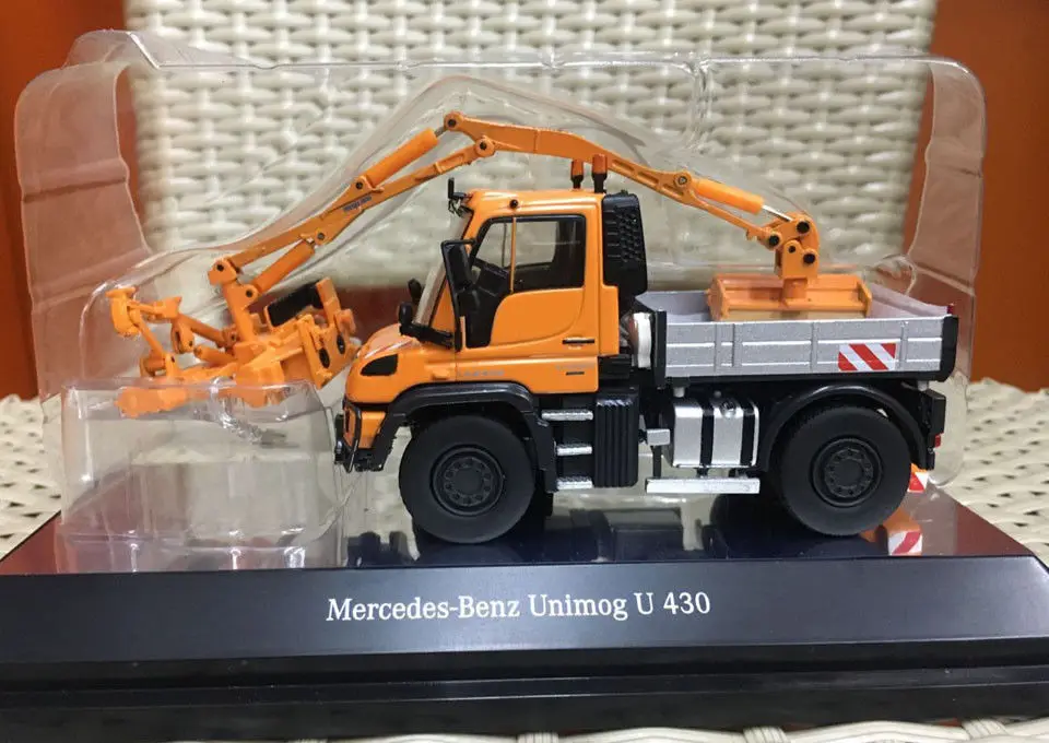 Mercedes Benz Unimog U 430 с комбинированным кожухом оранжевого цвета 1/50 от NZG 9101|scale