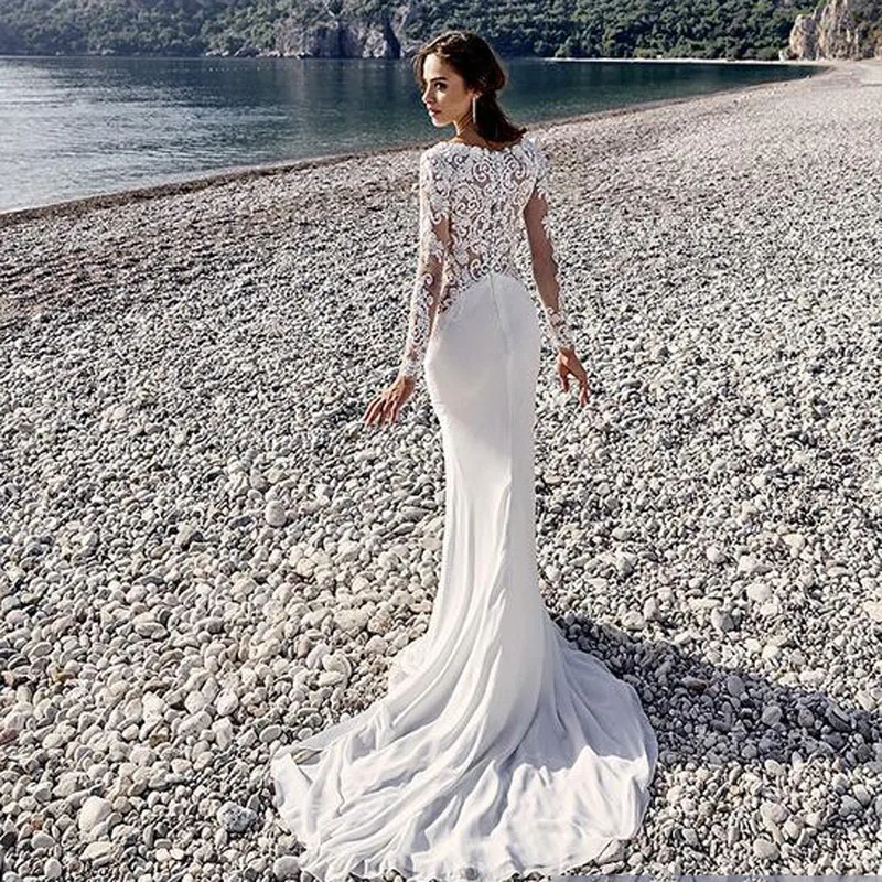 Romantic Arabic Vintage Mermaid Dresses 2018 Bohemian White Beach Gowns Lace Applique Long Sleeve Dress
Romantic Arabic Vintage Mermaid Dresses 2018 Bohemian White Beach Gowns Lace Applique Long Sleeve Dress