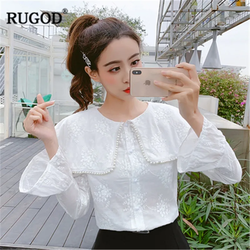 RUGOD Korean white women blouse Casual flare sleeve turn-down collar pearl beading lady shirts sweet office wear blusas de mujer 
RUGOD Korean white women blouse Casual flare sleeve turn-down collar pearl beading lady shirts sweet office wear blusas de mujer