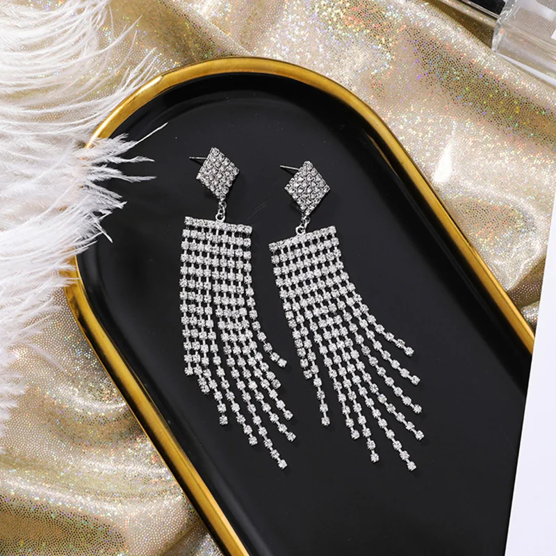 European and American style Fashion Rhinestone Geometric Tassel Earrings For Women Personality Long Zircon Exaggerated Jewelry
European and American style Fashion Rhinestone Geometric Tassel Earrings For Women Personality Long Zircon Exaggerated Jewelry